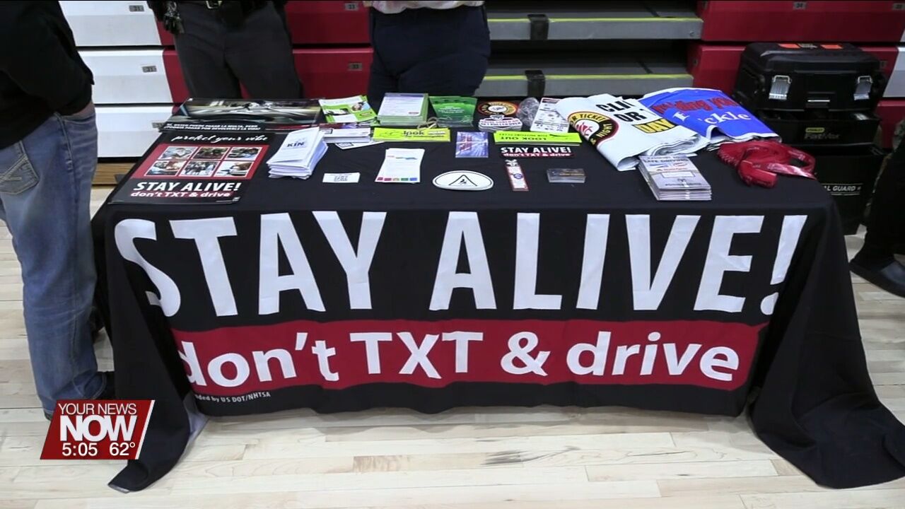Students from several local high schools take part in a safe driving assembly at Perry High School